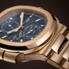 cf97c96e832e0bf280ac58604a6865e1a8b8e4b7 Patek Philippe Nautilus Travel Time Chronograph Watch, 18k Rose Gold, 40,5 mm, Ref# 5990/1R-001